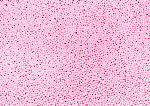 One green ball amongst millions of pink balls. Image shot 2007. Exact date unknown.