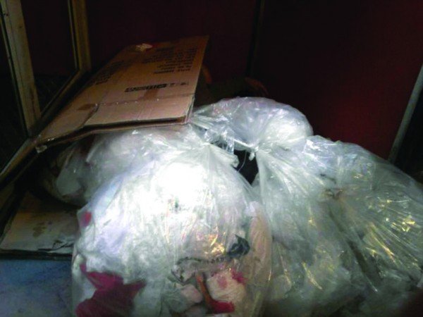 Person hidden in recycling. Photo: Environmental Services Association
