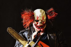 Clown with chainsaw