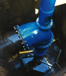 A contractor and a water management company have been fined after a worker was injured when he was hit by a 1.5 tonne water valve.